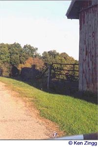 An old barn stands almost on the shoulder of Tunnelville Road