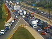 Traffic condition camera image showing traffic congestion.