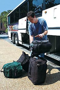 Photo of passenger preparing to board a bus.