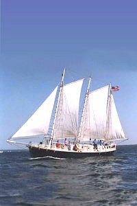 The schooner ZEETO setting sail by the Apostle Islands.